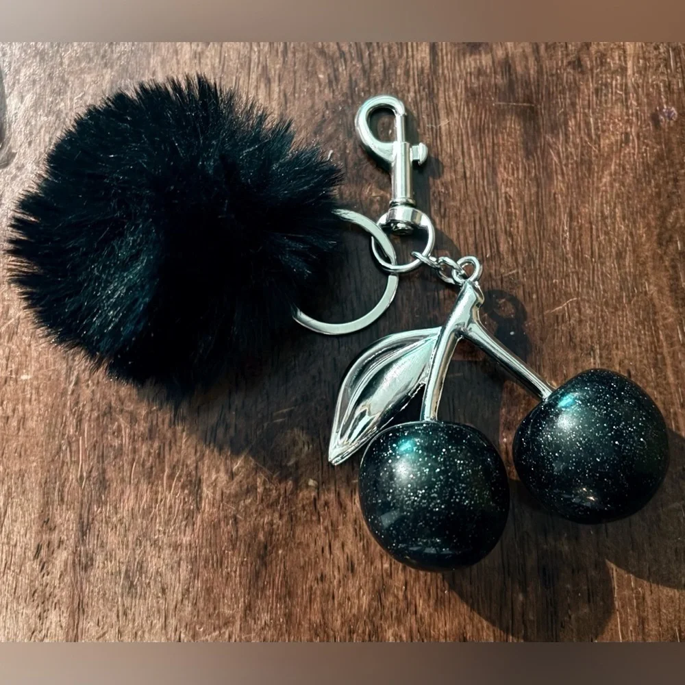 NWOT Elegant Black and Silver Cherry Key Holder With Black Pom Pom